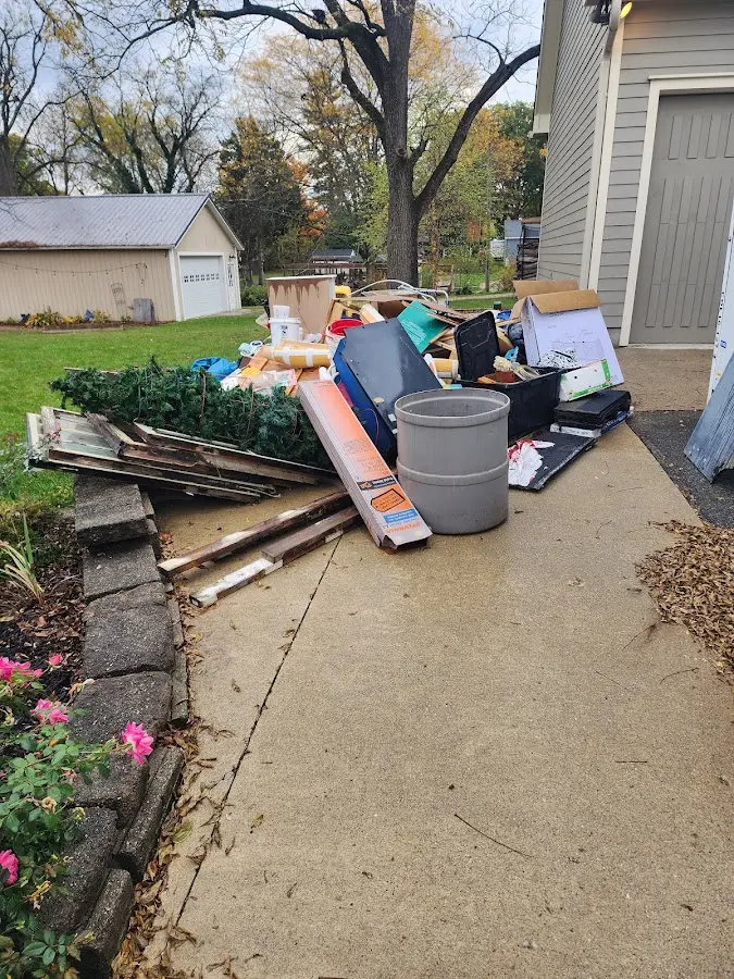 Dumpster being loaded with debris for 3 Yard Dumpster Rental in Rancho Palos Verdes